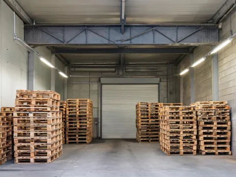 Indoor dock with overhead beam